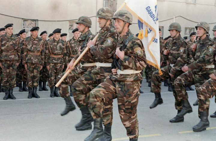 Bosnian soldiers march in Sarajevo on November 24, 1991